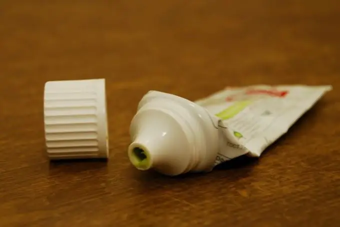 What do the colored stripes on the toothpaste tubes mean?